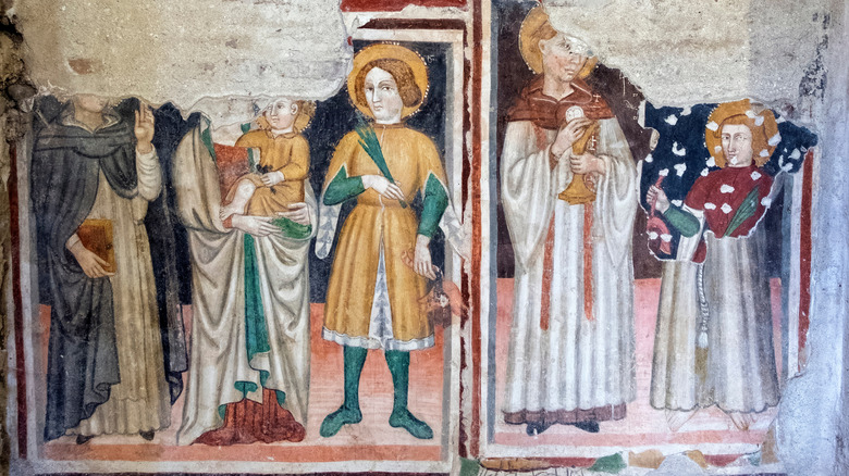 Fresques peints à la main par un peintre médiéval inconnu trouvé à l'intérieur de l'Église médiévale de Santa Maria Impensole, découverte dans les années 1960 dans le complexe souterrain de Narni en Ombrie, en Italie